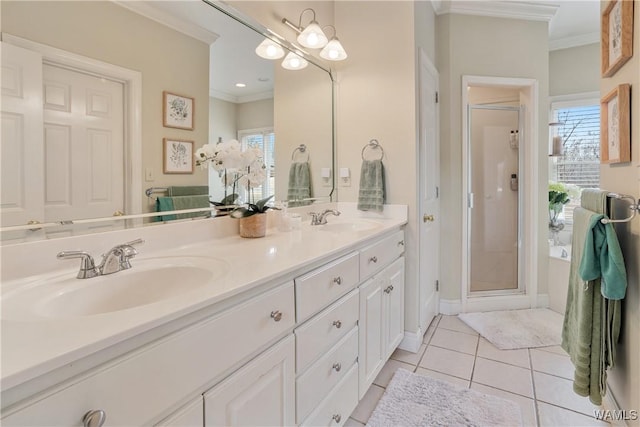 full bathroom featuring ornamental molding, tile patterned flooring, a sink, and double vanity