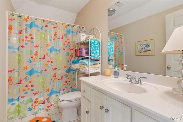 bathroom featuring toilet, a shower with shower curtain, visible vents, vanity, and tile patterned floors