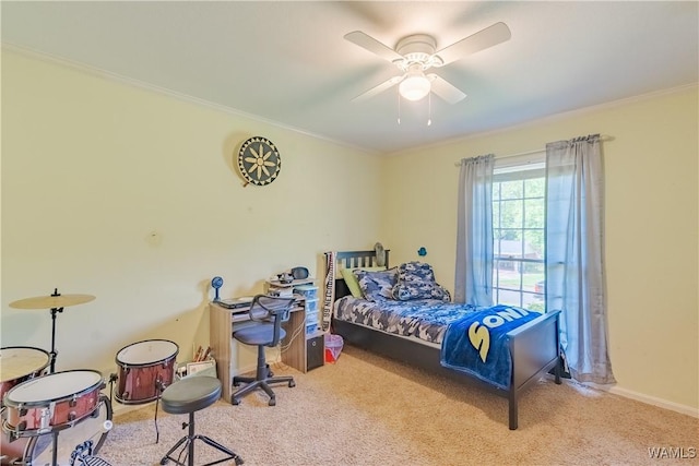 3709 Diamond Ln, Northport, AL 35473 - bedroom with crown molding, carpet, baseboards, and a ceiling fan