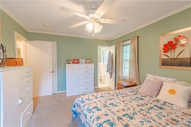 3709 Diamond Ln, Northport, AL 35473 - bedroom featuring light colored carpet, ornamental molding, ceiling fan, and connected bathroom