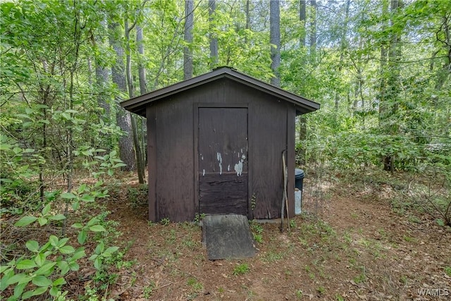3709 Diamond Ln, Northport, AL 35473 - view of shed featuring a view of trees