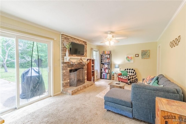3709 Diamond Ln, Northport, AL 35473 - carpeted living room with healthy amount of natural light, crown molding, a brick fireplace, and ceiling fan