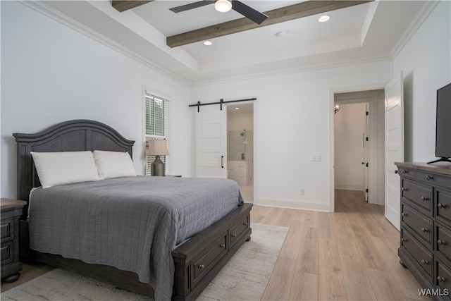 bedroom with ensuite bathroom, ceiling fan, crown molding, a barn door, and light hardwood / wood-style flooring