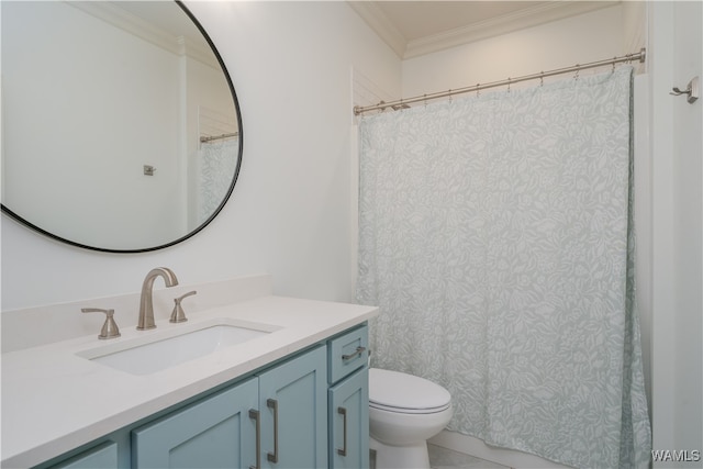 bathroom with vanity, toilet, and crown molding