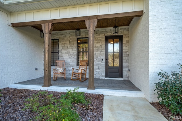 doorway to property featuring a porch