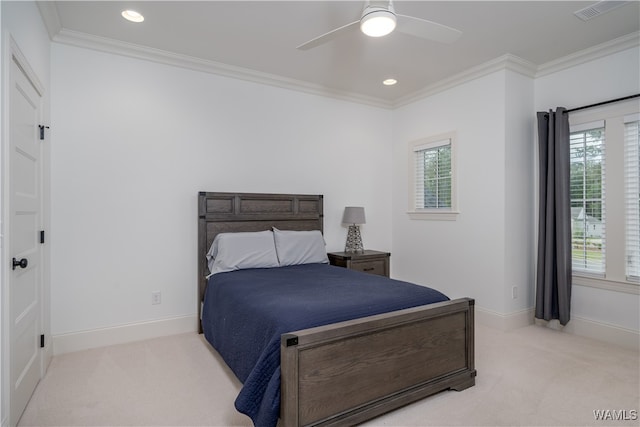 bedroom with ceiling fan, light carpet, and ornamental molding