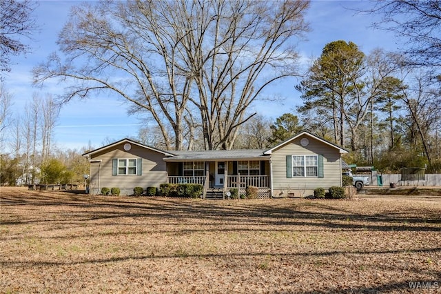 single story home with a front yard and a porch