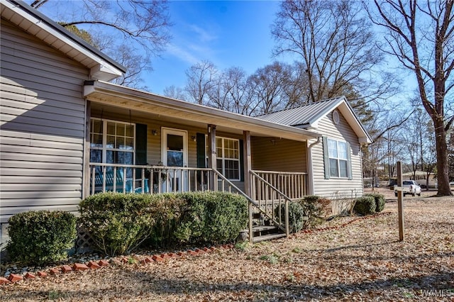 entrance to property with a porch