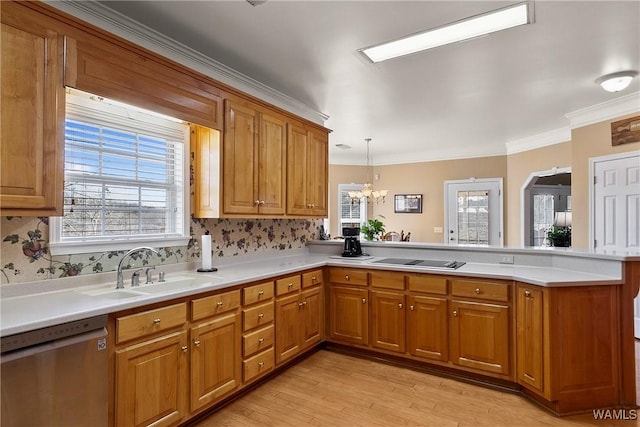 kitchen with brown cabinetry, dishwasher, a peninsula, light countertops, and a sink