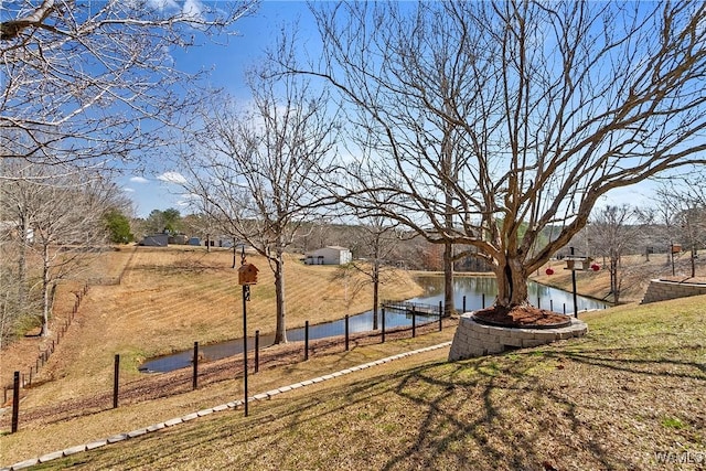 view of yard with a water view