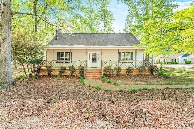 12863 N Country Dr, Tuscaloosa, AL 35475 - view of front facade with roof with shingles and covered porch