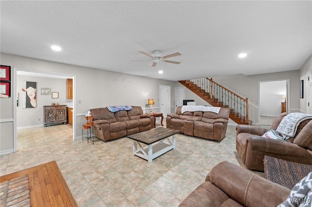 12863 N Country Dr, Tuscaloosa, AL 35475 - living area with baseboards, a ceiling fan, recessed lighting, and stairs