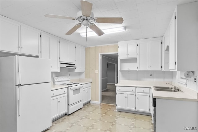 kitchen with white appliances, white cabinetry, ceiling fan, and sink