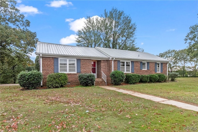 ranch-style home with a front yard