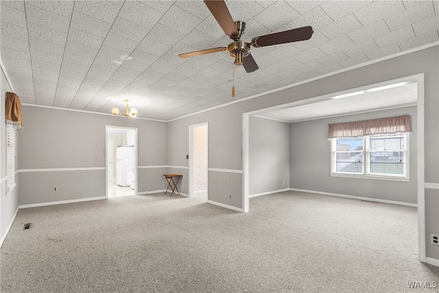 carpeted empty room with crown molding and ceiling fan with notable chandelier