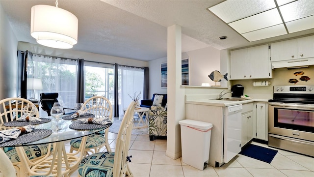 kitchen with electric stove, sink, light tile floors, white cabinets, and dishwasher