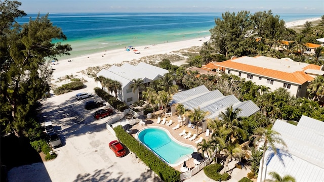 aerial view featuring a beach view and a water view