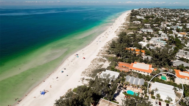 aerial view featuring a beach view and a water view