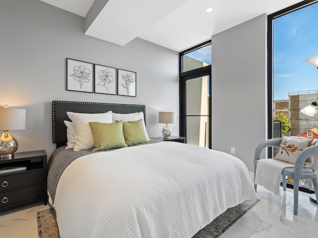 bedroom with expansive windows