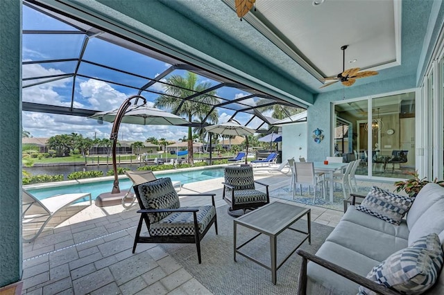 view of patio / terrace with an outdoor hangout area, a lanai, and ceiling fan