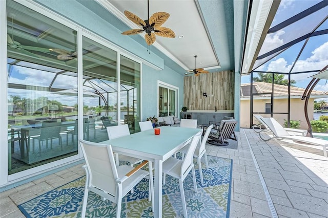 sunroom / solarium with ceiling fan