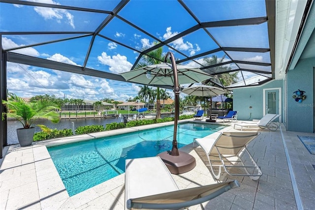 view of pool featuring a patio area and a lanai