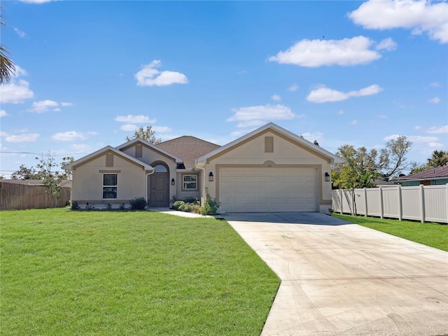 view of front facade featuring a garage and a front lawn