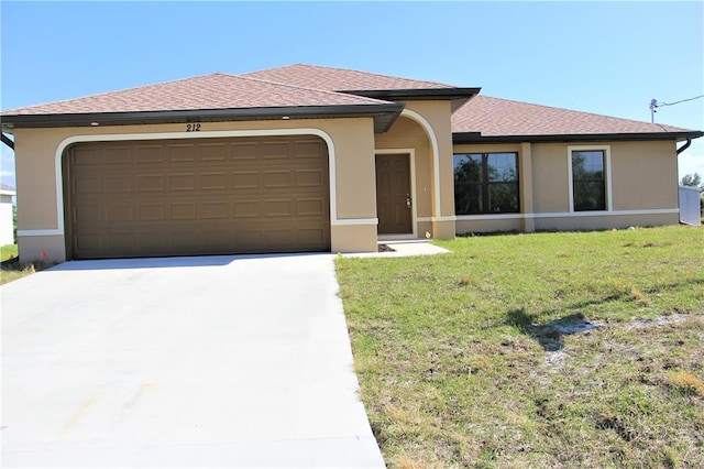 view of front of property featuring central air condition unit, a front yard, and a garage