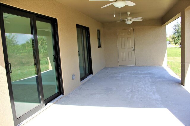 view of terrace featuring ceiling fan