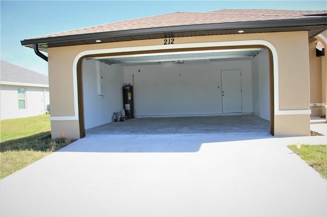 garage featuring water heater