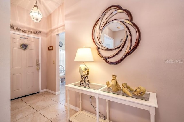 entrance foyer with light tile patterned floors