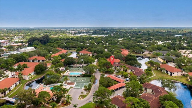 bird's eye view with a water view