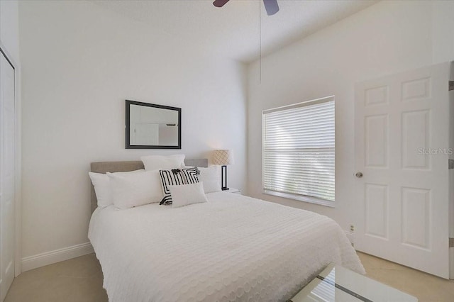 bedroom featuring ceiling fan and a textured ceiling