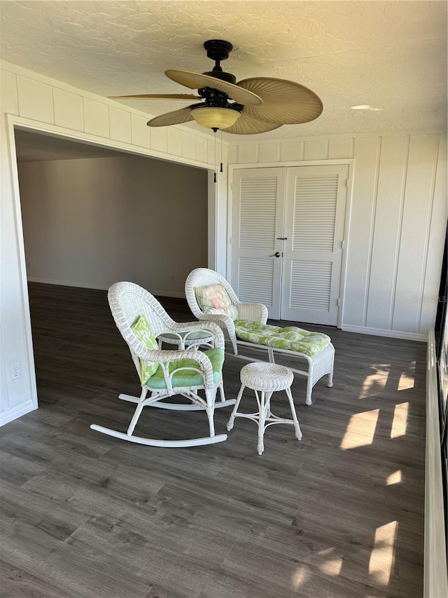 wooden terrace featuring ceiling fan