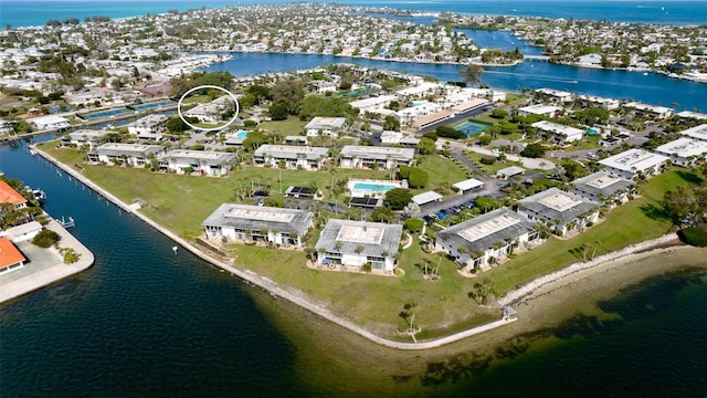 bird's eye view with a water view