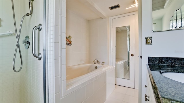 bathroom featuring tile patterned floors and vanity