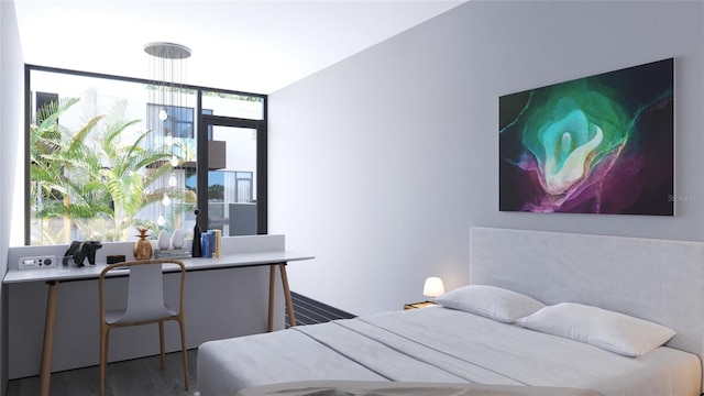 bedroom featuring wood-type flooring