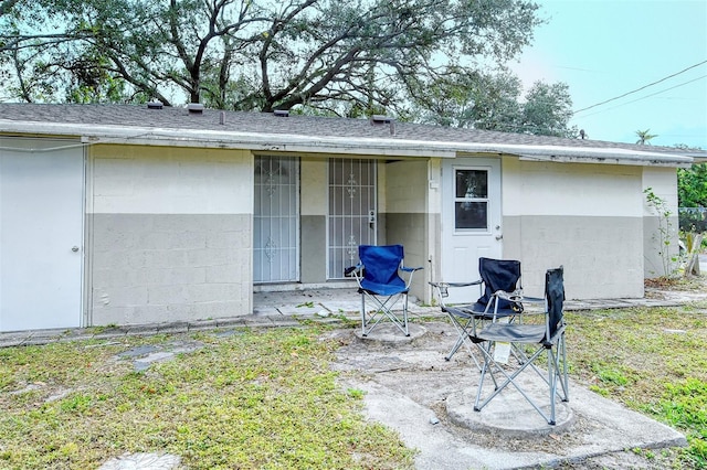 back of house with a yard