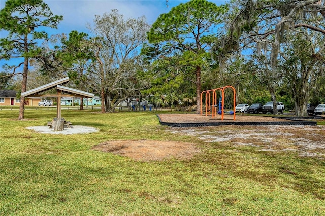 view of playground featuring a lawn