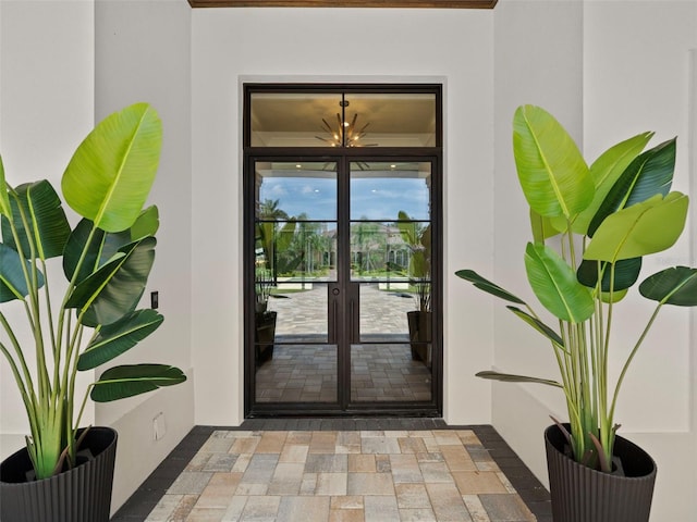 property entrance featuring french doors