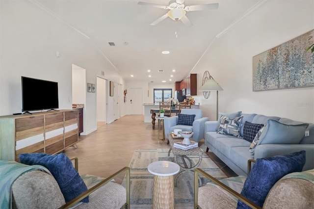 tiled living room with crown molding and ceiling fan