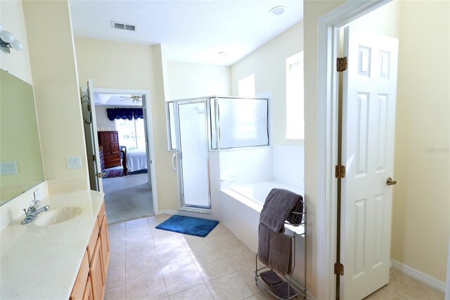 255 Royal Palm Dr, Davenport, FL 33837 - ensuite bathroom with a garden tub, ensuite bath, visible vents, and a stall shower