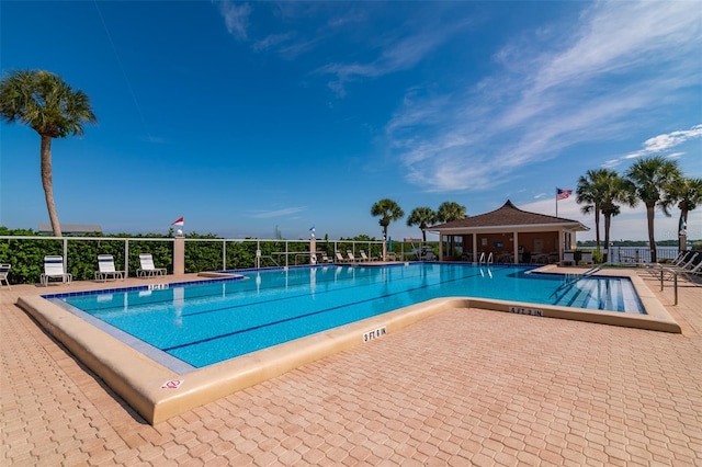 view of pool featuring a patio