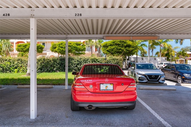 view of parking with a carport