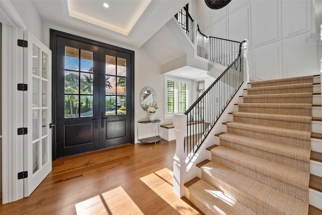 entryway featuring french doors and hardwood / wood-style floors