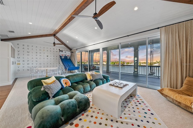 living room featuring wooden ceiling, lofted ceiling with beams, expansive windows, ceiling fan, and light hardwood / wood-style floors