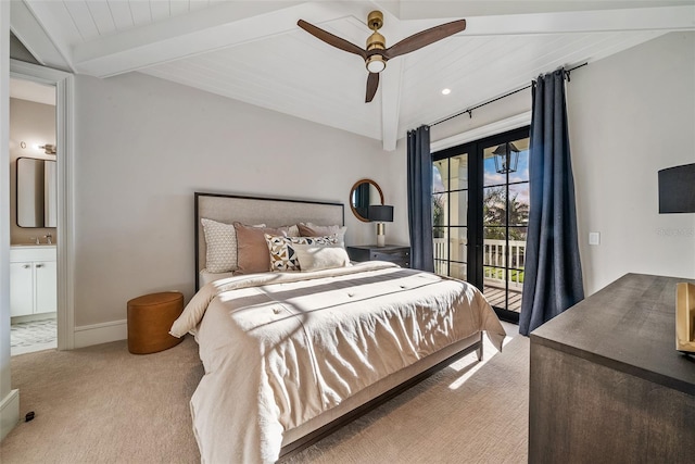 bedroom featuring beam ceiling, ensuite bath, ceiling fan, light colored carpet, and access to outside