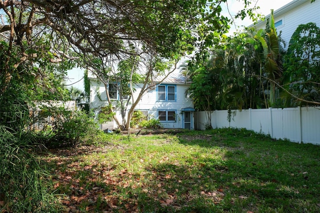 view of yard featuring fence