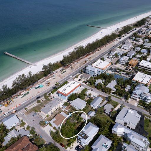 aerial view featuring a beach view and a water view