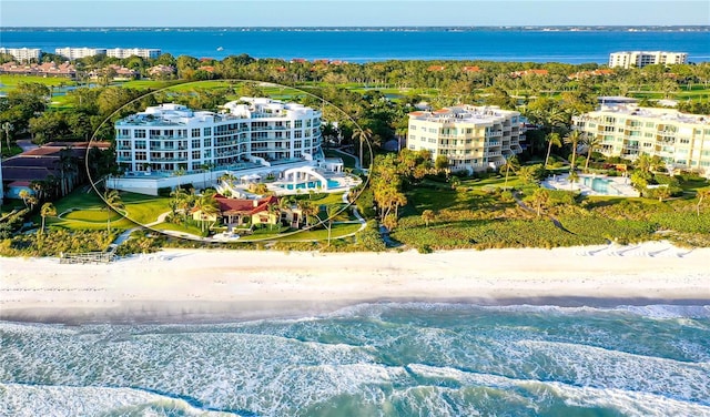 aerial view featuring a beach view and a water view